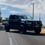 Black Volkswagen Amarok on the road with Canna Fabrication short-entry stainless snorkel fitted