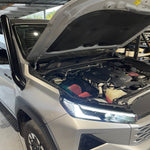 Toyota Hilux N90 with bonnet open during Canna Fabrication snorkel and airbox install