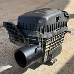 Canna Fabrication 4-inch stock-airbox inlet adapter fitted to a factory 4WD airbox