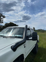 Toyota Hilux LN106 4" Long-Entry Stainless Snorkel by Canna Fabrication — brushed silver