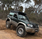 Nissan Patrol GU Teardrop 4.5" Mid Entry Stainless Snorkel (Series 1-3) by Canna Fabrication — brushed silver