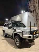 Nissan Patrol GU Teardrop 4.5" Mid Entry Stainless Snorkel (Series 4) by Canna Fabrication — brushed silver