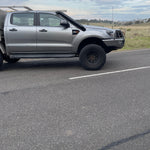 Silver Ford Ranger PX side profile showing the Canna Fabrication short-entry stainless snorkel