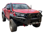 Red Toyota Hilux N80 with Canna Fabrication short-entry stainless snorkel — front view